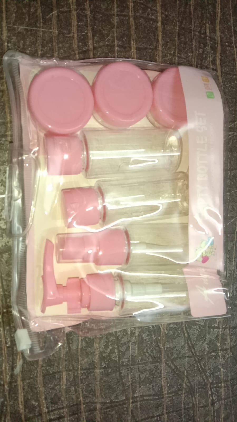 Portable Travel Cosmetic Bottles – 7 Pcs Plastic Pressing Spray Set